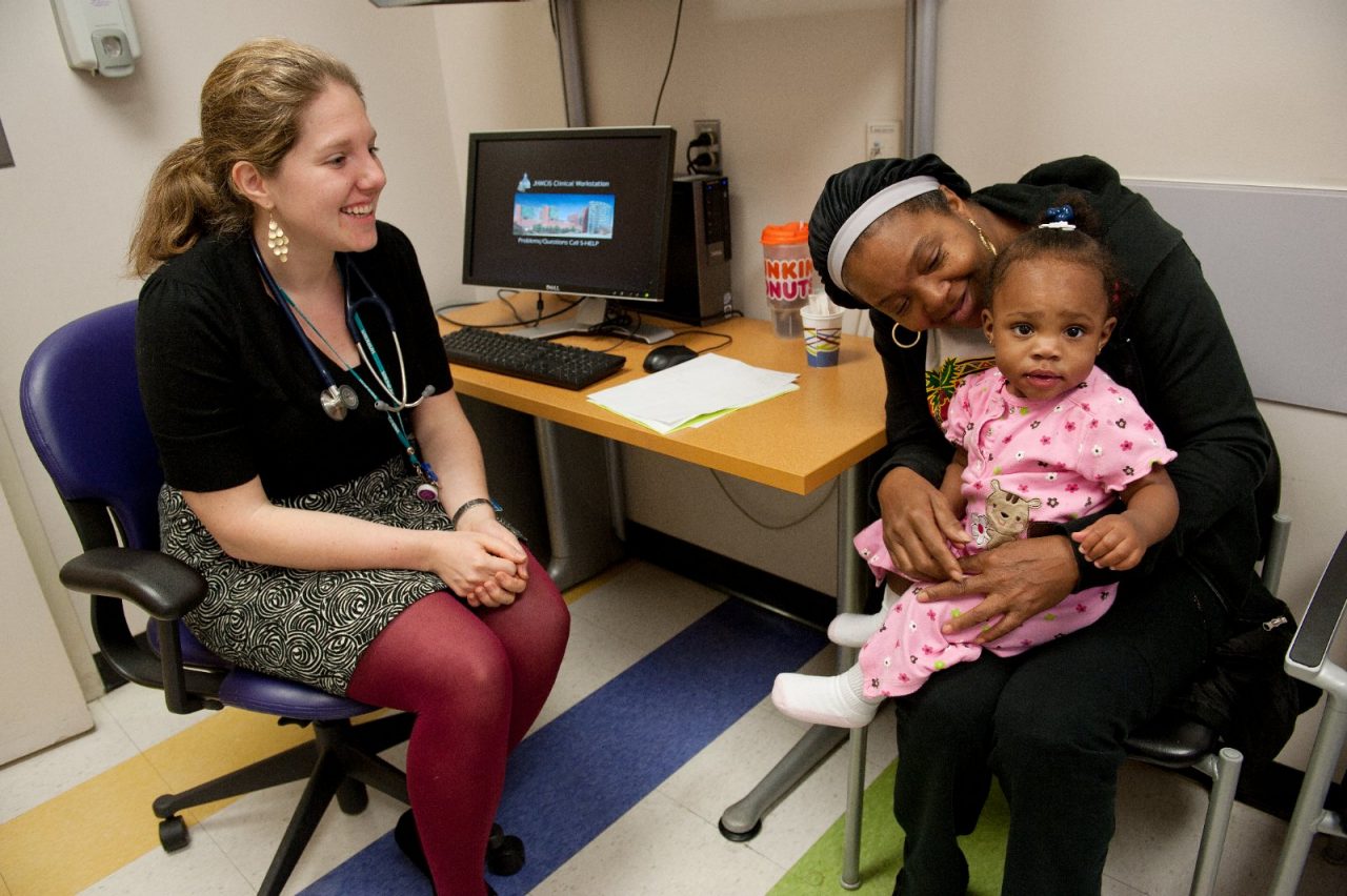 BALTIMORE- DECEMBER 02, 2010: A former Health Leads volunteer who has since gone into practicing medicine sees a patient at the Harriet Lane Clinic in Baltimore, MD.