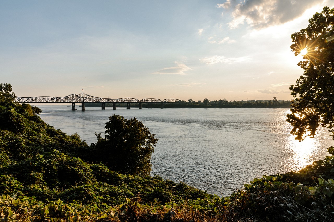 The sun setting over the Mississippi River. 