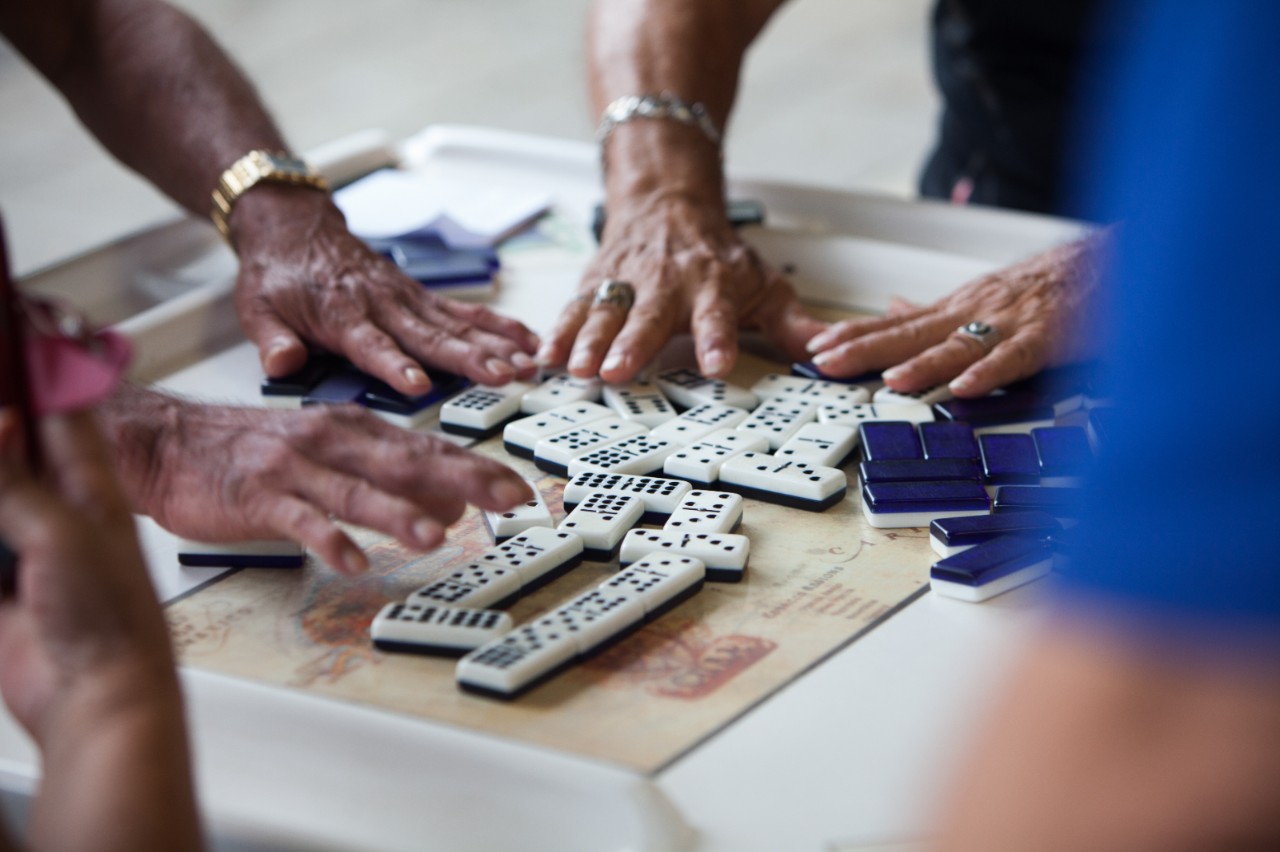 RWJF COH Miami, August 29-31, 2016. Neighborhood pictures in Little Havana area of Miami. People playing dominos in Domino Park. These are shot on "Calle Ocho" (8th Street), the main cultural area of Little Havana's Cuban culture.