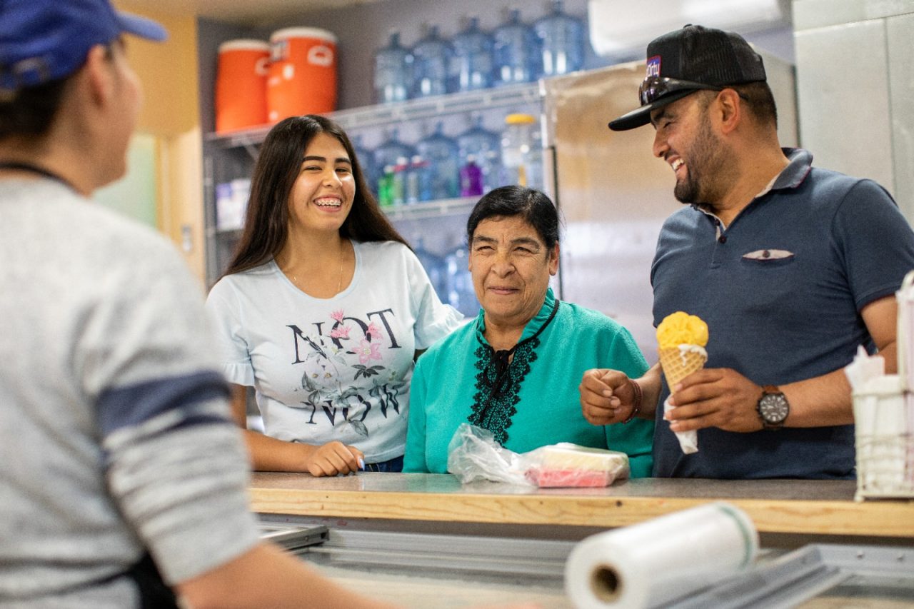 A happy family at an ice cream shop. 